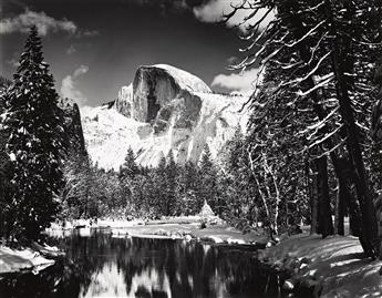 ANSEL ADAMS (1902-1984) Half Dome, Merced River, Winter. 1938; printed 1962-63.                                                                  